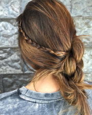 messy bun with a braid